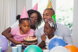 Happy,Family,Celebrating,A,Birthday,Together,At,Home,In,The